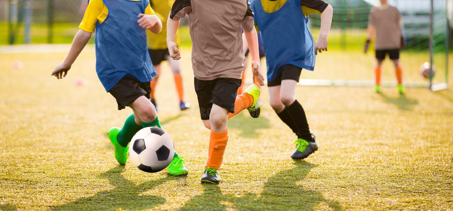 Children playing soccer