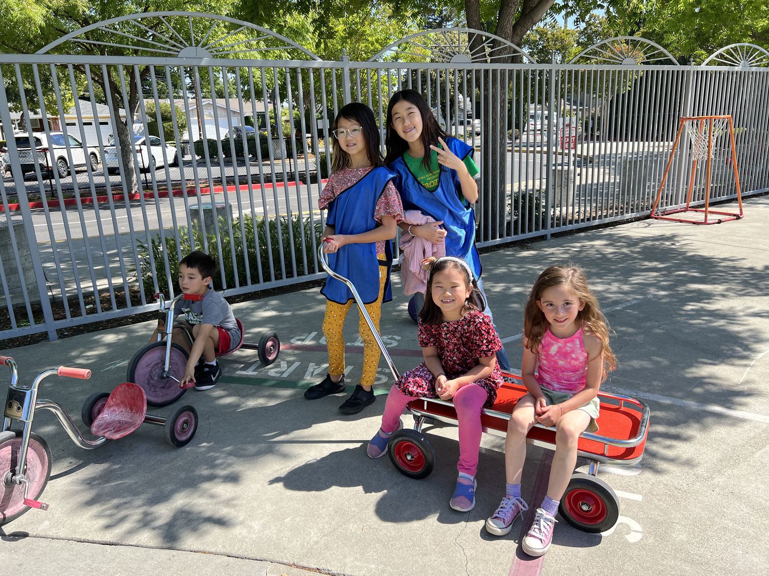 4th graders help kindergarteners with wagon