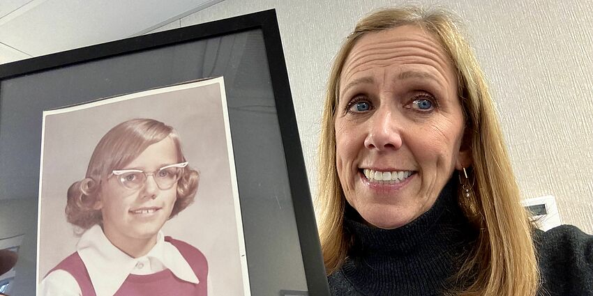 Principal Burbank with her 3rd grade picture.