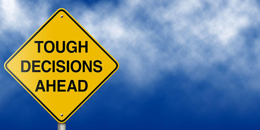 sign: Tough Decisions Ahead