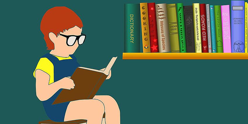 child sitting on a stack of books reading a book-clip art