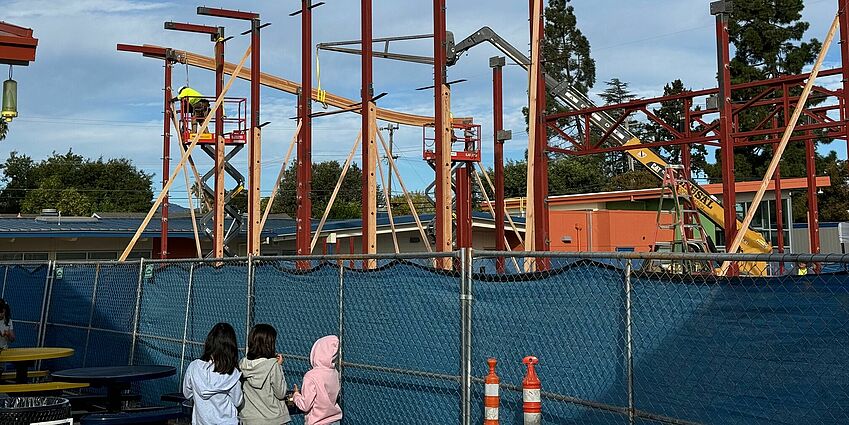 First beam placed on multi-use construction.