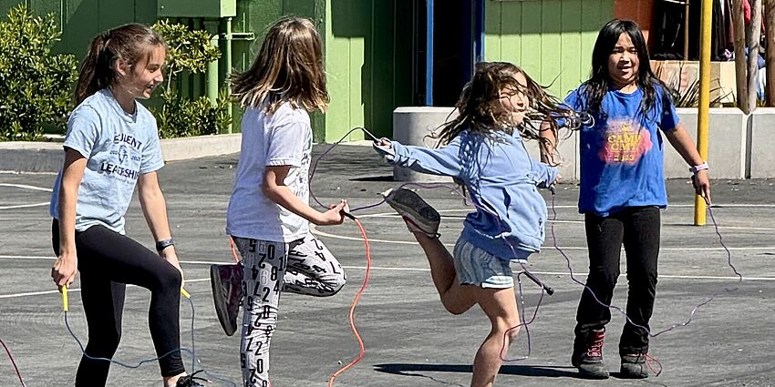 Four learners jump roping for American Heart Association.