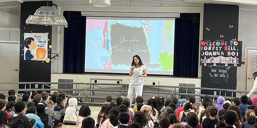 Author Joanna Ho and students