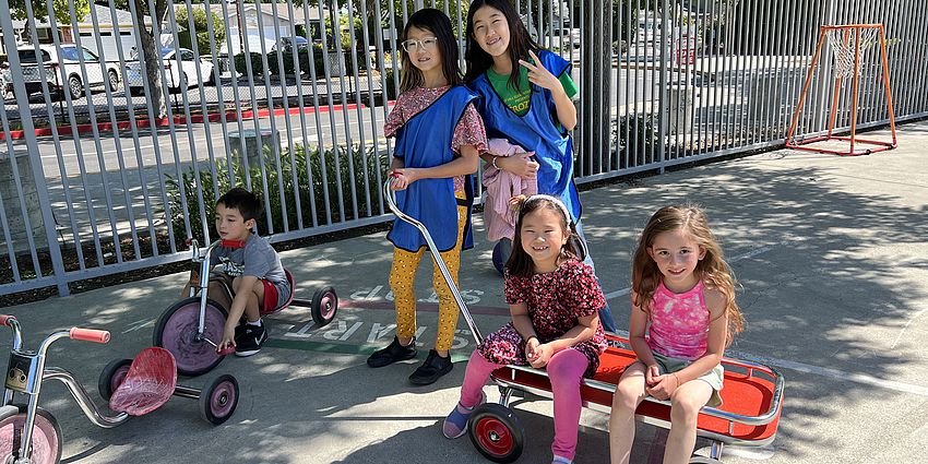4th graders help kindergarteners with wagon