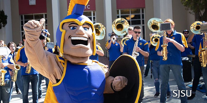 SJSU Spartan mascot with pep band