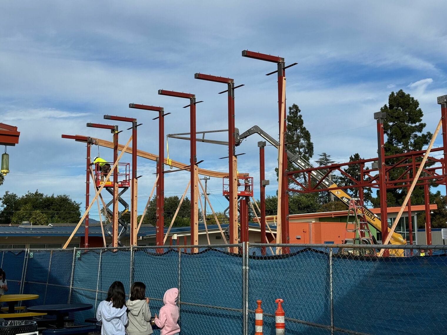 First beam placed on multi-use construction.