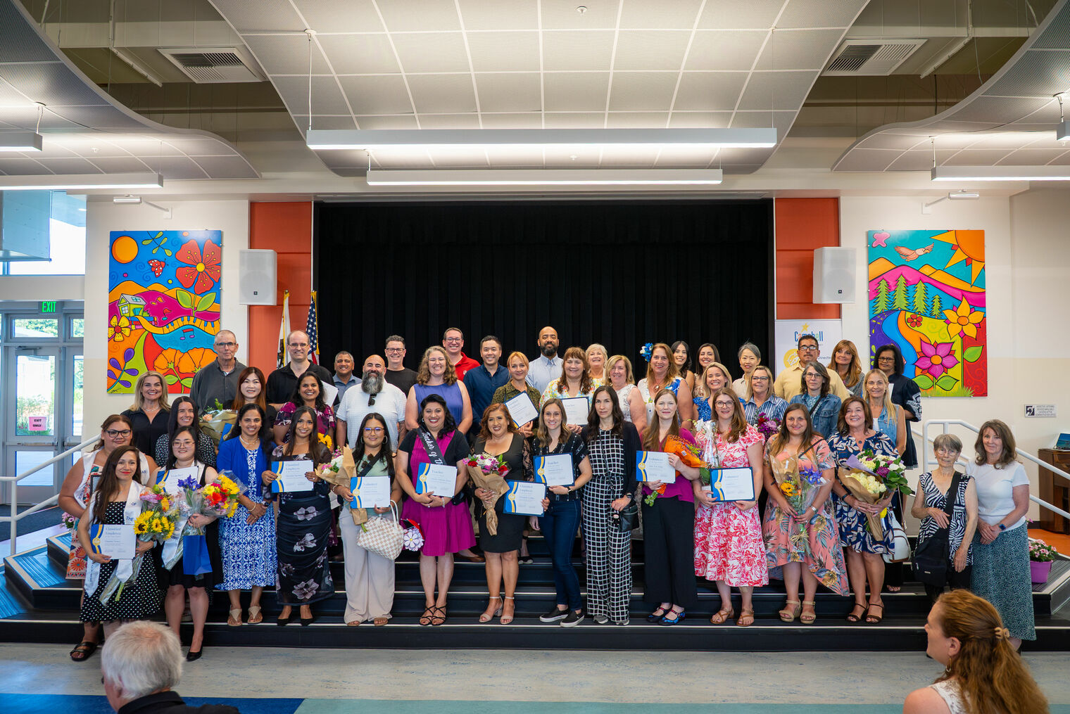 Honorees from the May 2026 staff and volunteer recognition ceremony