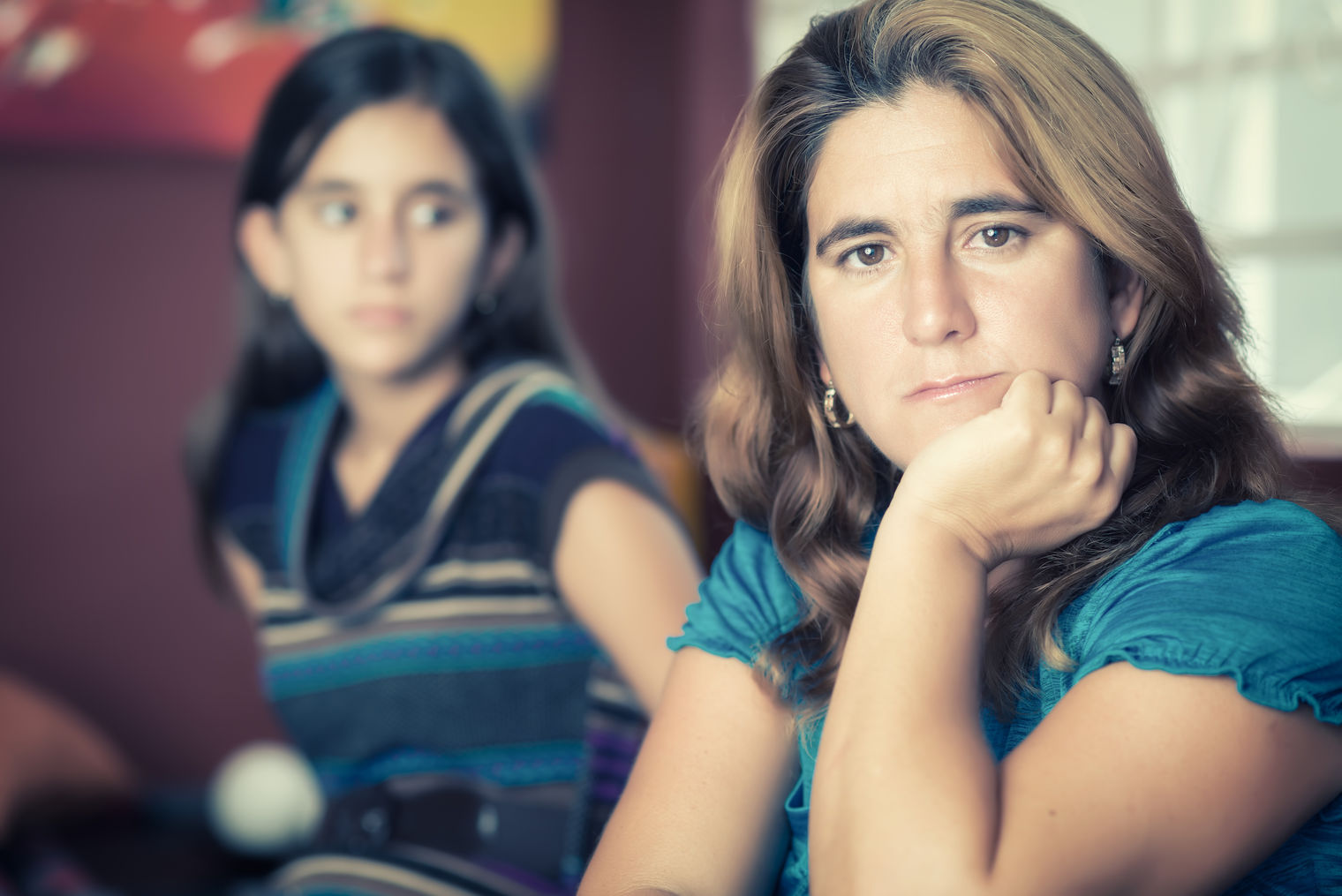 mom looking worries about daughter